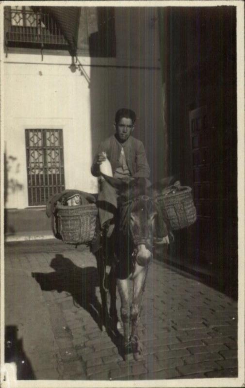 Spain - Spanish Man Donkey Milk Seller Vendor w/ Baskets Real Photo Postcard