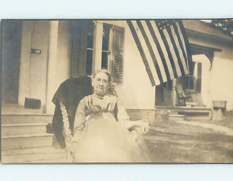 Pre-1918 rppc patriotic LARGE USA FLAG HANGING BEHIND GRANDMA ON CHAIR HM0129