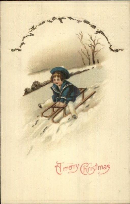Christmas - Little Boy in Blue Sledding c1910 Postcard rpx
