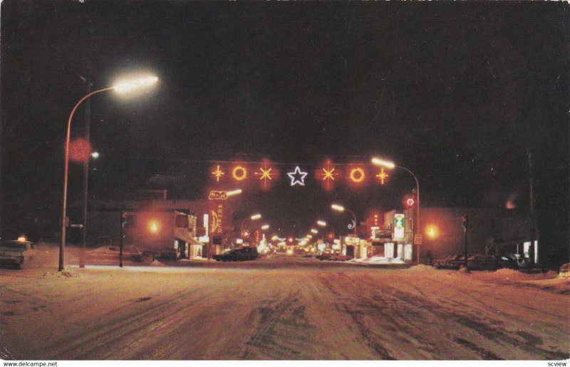 CHIBOUGAMAU , Quebec , Canada , 1984 ; Main Street at Night , Christmas