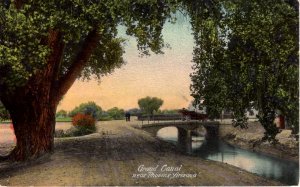 Phoenix, Arizona - A car driving over the bridge at the Grand Canal - c1908