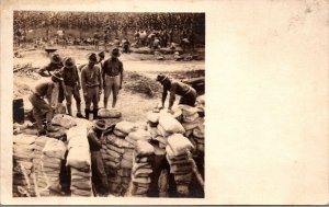 Real Photo Postcard Military Men in the Field Building Bunker