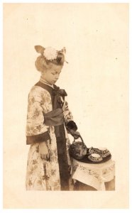 Geisha Child Girl serving Tea, RPPC