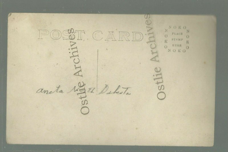 Aneta NORTH DAKOTA RPPC c1910 GENERAL STORE Give-away FREE COFFEE Range Exhibit