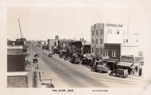 J79/ Val D'Or Quebec Canada RPPC Postcard c1940s Main Street Stores  371