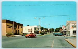 ZEPHYRHILLS, FL Florida ~ STREET SCENE c1960s Cars VW ~Elsie's 5 & 10  Postcard