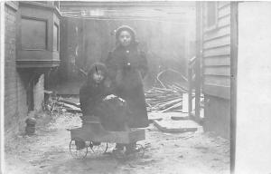 Young children in wagon Child, People Photo 1911 Missing Stamp 