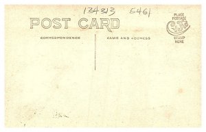 Cobbler repairing shoe by hand