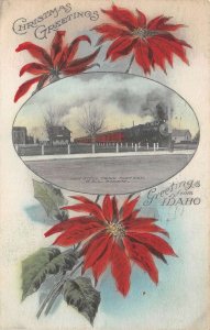 Idaho Christmas Greetings OSL Railway Mail Train Poinsettia Flowers PC AA59607