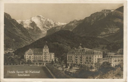 Mountain Scene in Switzerland showing 2 hotels Savory & National Interlaken