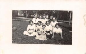 GROUP OF BOYS & GIRLS IN GROUP PHOTO~LARGE BALL REAL PHOTO POSTCARD c1900s