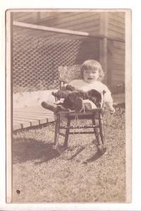 Real Photo, Little Girl Sitting on Chair Outside