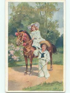 Pre-Linen BOY WALKS BESIDE CUTE GIRL RIDING BEAUTIFUL HORSE W7114