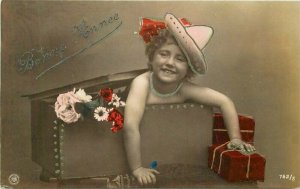 Girl Gift Box Hat Flowers #762-5 Happy New Year Postcard RPPC real Photo 21-225