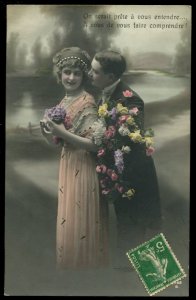 Vintage French romantic tinted RPPC. On serait prete a vous entendre...