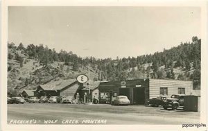 Wolf Creek MT Gas Station Cars RPPC Postcard