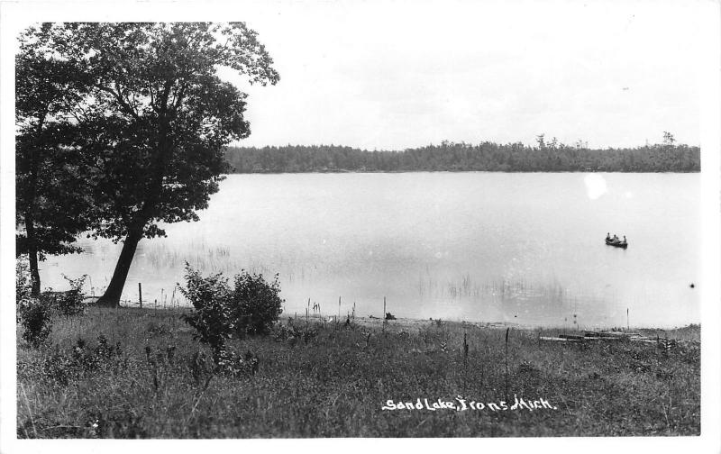 Irons Michigan~Sand Lake View~People in Canoe~Lake County~1940s RPPC-Postcard