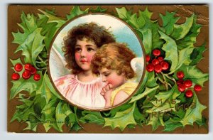 Christmas Postcard Cherub Angles Embossed Holly Leaves AMP Xmas Greetings Unused