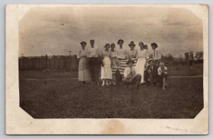 RPPC Family Proud To Be American With USA Flag c1910 Real Photo Postcard L27