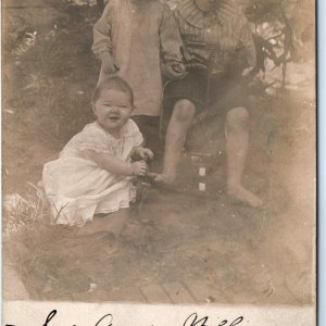 ID'd 1908 Cute Children Toy Car Baby Smile RPPC Real Photo Postcard Engle A111