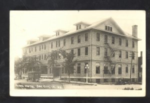 RPPC SAC CITY IOWA ROARK HOTEL OLD CARS VINTAGE REAL PHOTO POSTCARD HIAWATHA KS