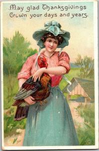 Thanksgiving Embossed Woman in Bonnet Holding Turkey c1917 Vintage Postcard Q27