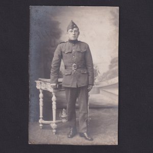 Real photo postcard, RPPC, WWI, soldier near the table, Uniform
