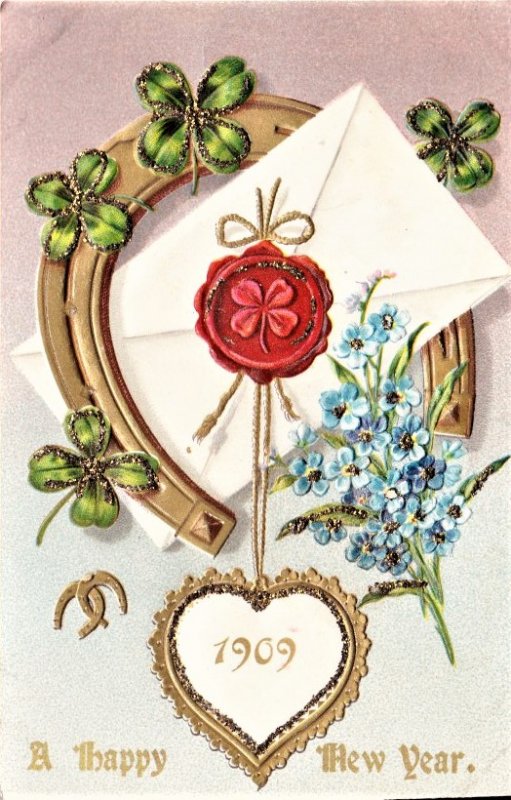 Vintage New Year Card. 1909 embossed with shamrocks for  a lucky year