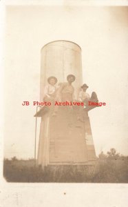 Unknown Location, RPPC, Men Sitting on a Water Tower? Photo