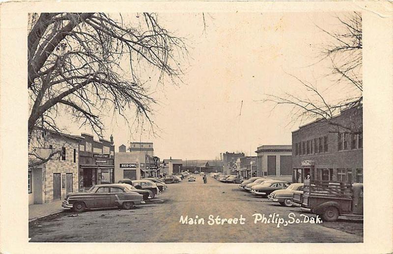 Philip SD Main Street Storefronts Old Siple Lager Sign RPPC Postcard