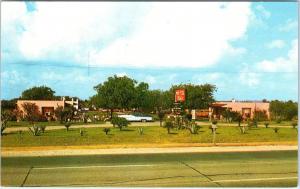 SAN BENITO, TX     OASIS MOTEL     c1950s   Car  Roadside    Postcard