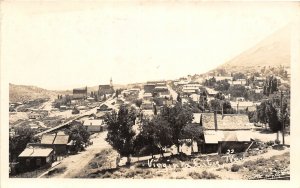 H26/ Virginia City Nevada RPPC Postcard c30s Birdseye Homes Church