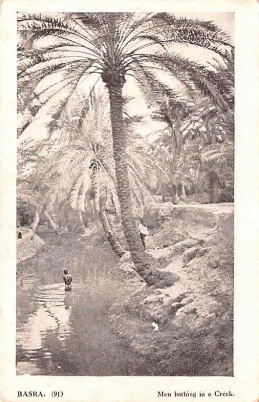 Men bathing in a Creek Basra Iraq Unused 