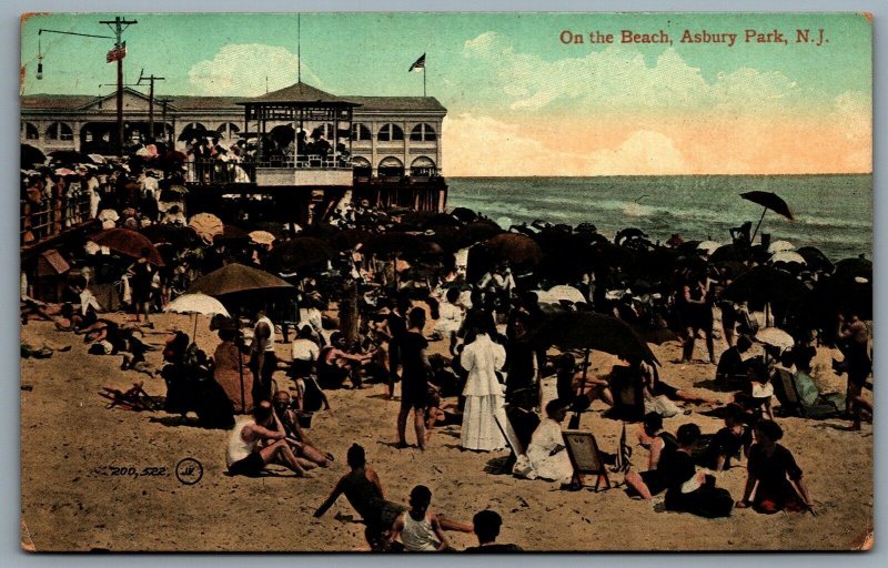 Postcard Asbury Park NJ c1910 On The Beach Umbrellas Bathers Crowds