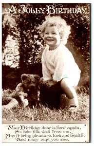 1910s A Jolly Birthday Child with Teddy Bear Real Photo Postcard