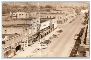 La Grande Oregon OR Postcard RPPC Photo Street View Flanks Drugs Store Gift Shop