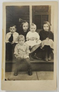 RPPC Siblings Seated on Steps Darling Children c1920 Postcard R4