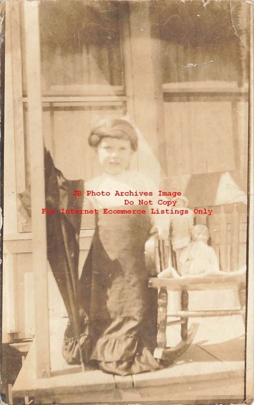 OK, Drumwright Oklahoma Postmark, RPPC, Girl Posing with Dolls Sitting in Chair