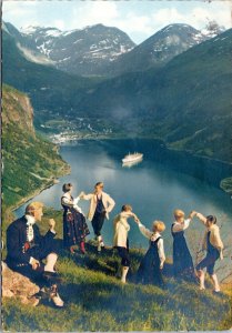 postcard Norway - Geiranger - Family dancing in mountains