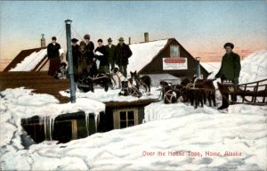 Nome Alaska Rooftop Gathering Snow Sled Dogs c1900-20s Vintage Postcard
