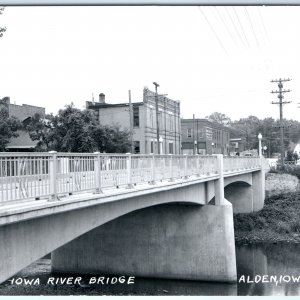 c1950s Alden, IA Downtown RPPC River Bridge Photo Main St Case IH Postcard A93