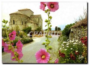 Modern Postcard Talmont The XII century Romanesque church with hollyhocks