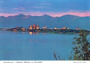 VINTAGE POSTCARD CONTINENTAL SIZE ANCHORAGE SKYLINE AT TWILIGHT