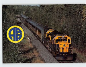 Postcard The Alaska Railroad carrying passengers via Denali National Park, AK