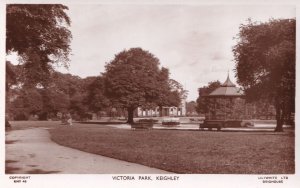 Man Bored in Victoria Park Keighley Real Photo Postcard