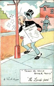 COMIC Man Reading Paper Bumps Head on Lamp-Post c1910 Postcard