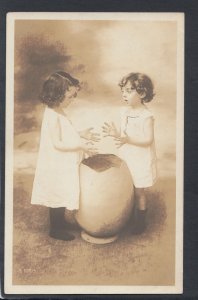 Children Postcard - Two Young Girls Stood Next To a Large Cracked Egg   RS18593