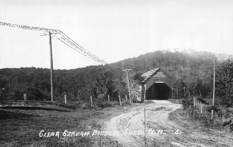 ERROL NH~CLEAR STREAM COVERED-DIRECTION SIGNS ON BRIDGE-REAL PHOTO POSTCARD