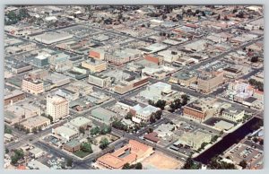 1940-50's BAKERSFIELD CALIFORNIA AERIAL VIEW NEWEST CITY IN AMERICA POSTCARD
