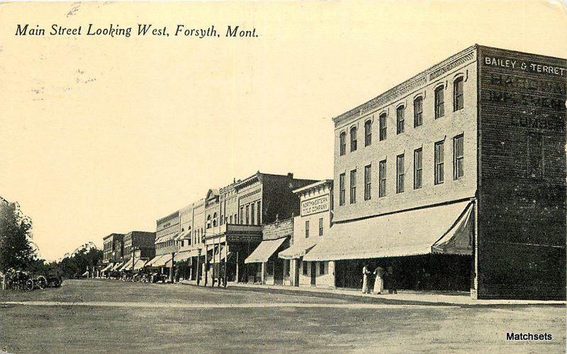 Main Street looking West FORSYTH MONTANA Racket store postcard 8658